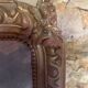 Large antique mirror in wood and gilded stucco.