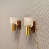 Two smaller wall lamps, made of crystal, rosewood hanging with brass colored details