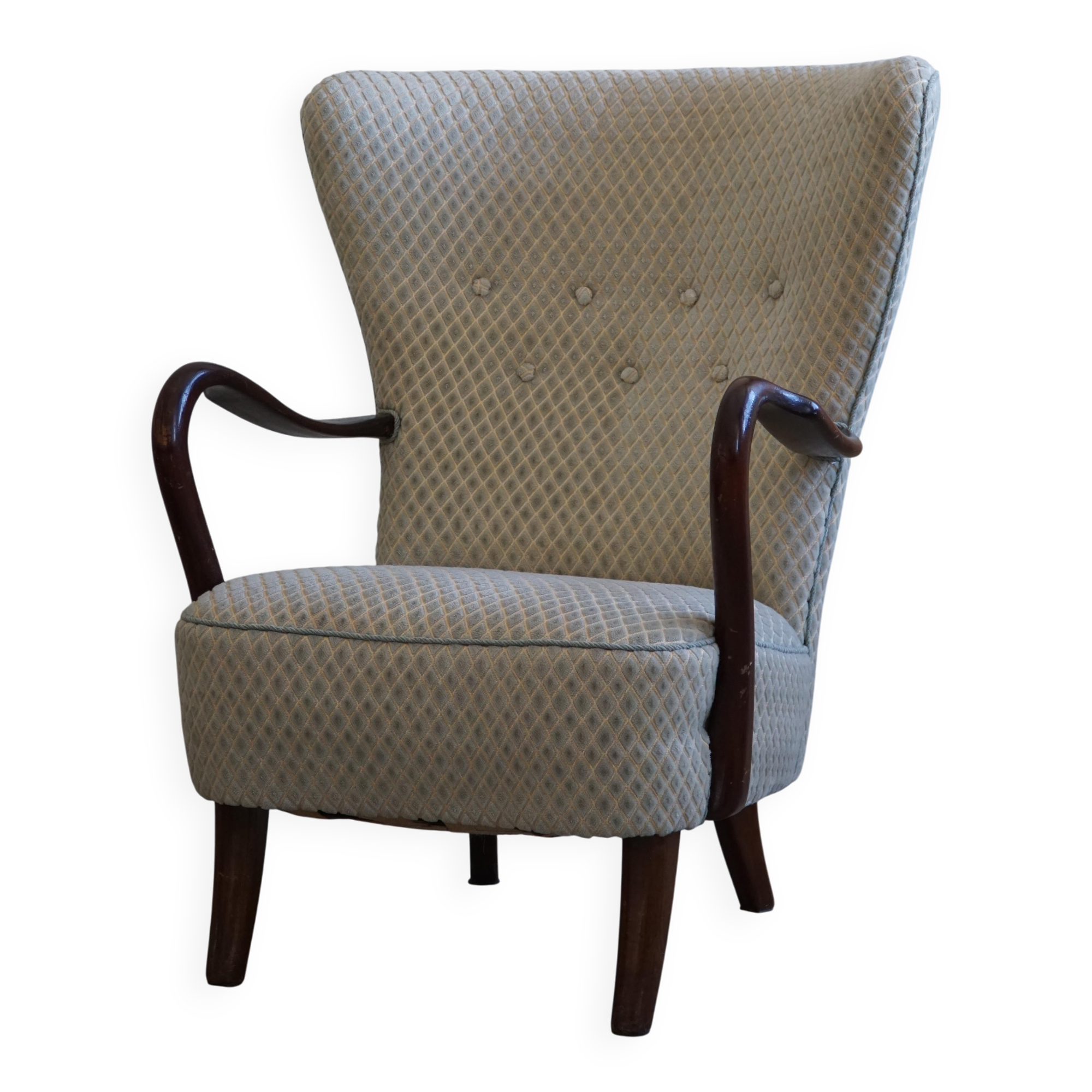 Slagelse Møbelfabrik, modern Danish lounge armchairs with beech footrests, 1960s.