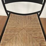 Set of 8 chairs in black lacquered metal and straw seats