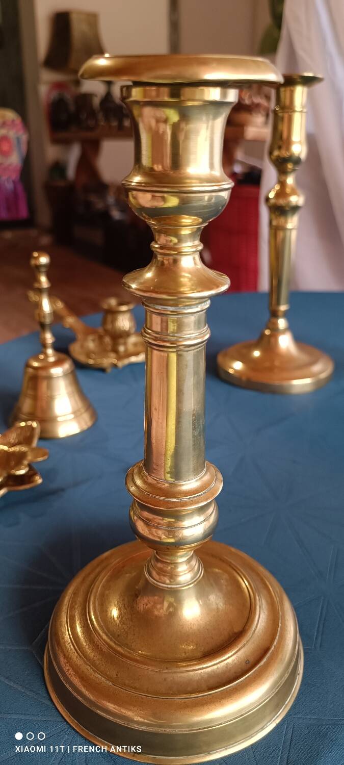 Bronze candlestick or torch holder from the Louis XIV period, France, 17th century.