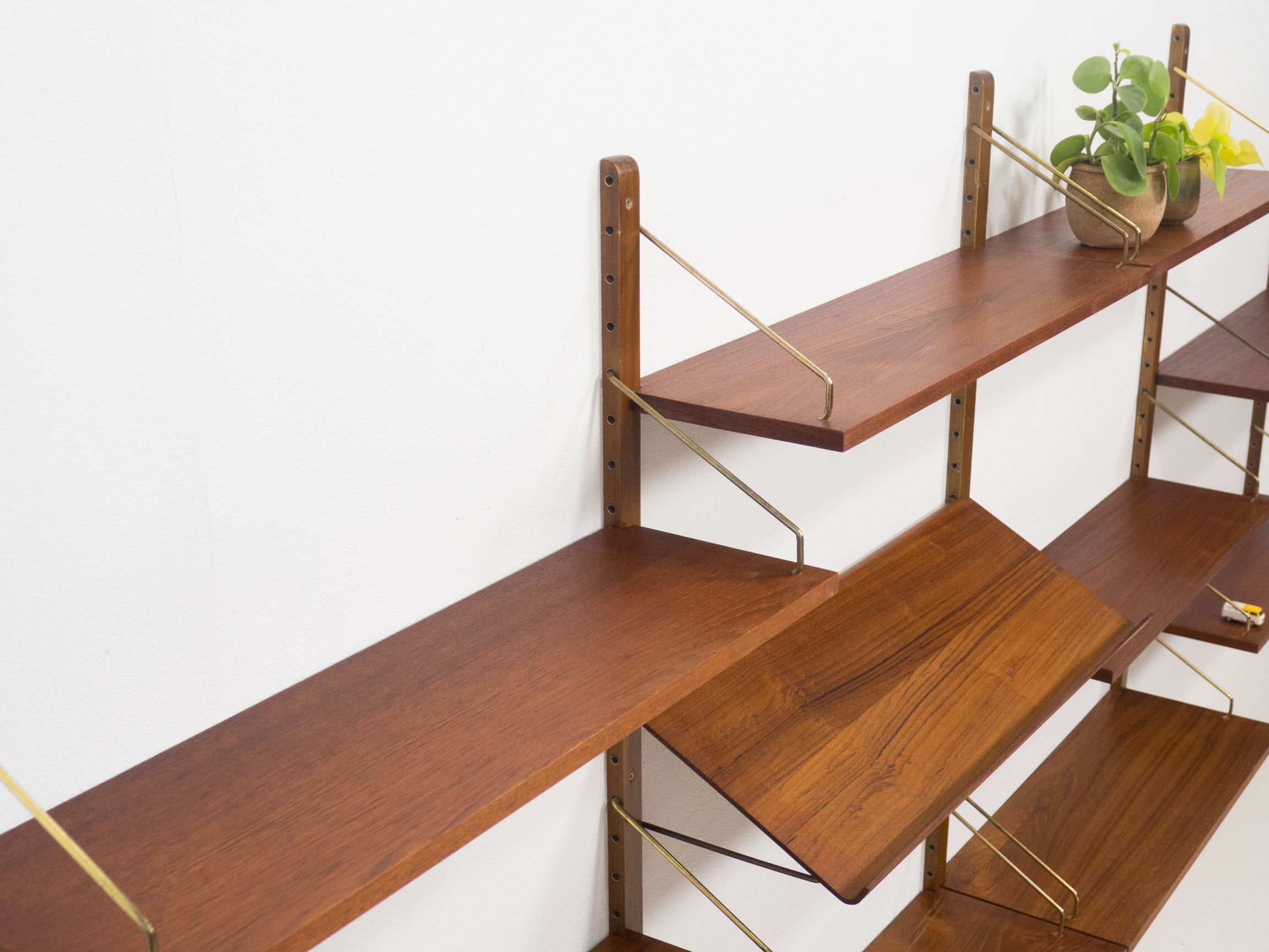 Royal System teak wall unit by Poul Cadovius