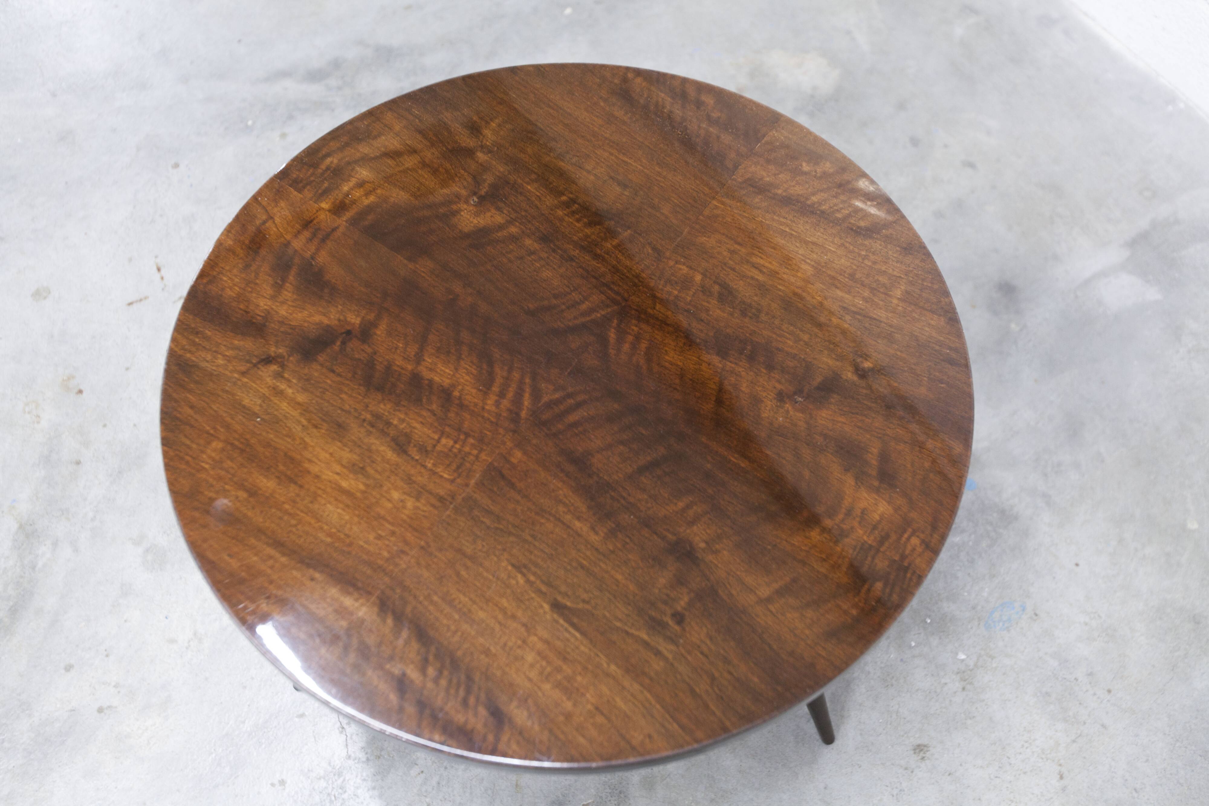 1960s Scandinavian tripod coffee table with glossy varnish in mahogany wood.