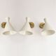 Set of three Italian wall lights in brass and lacquered iron, 1950s design
