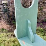 Old curved wooden farm bench