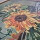 Signed painting depicting sunflowers