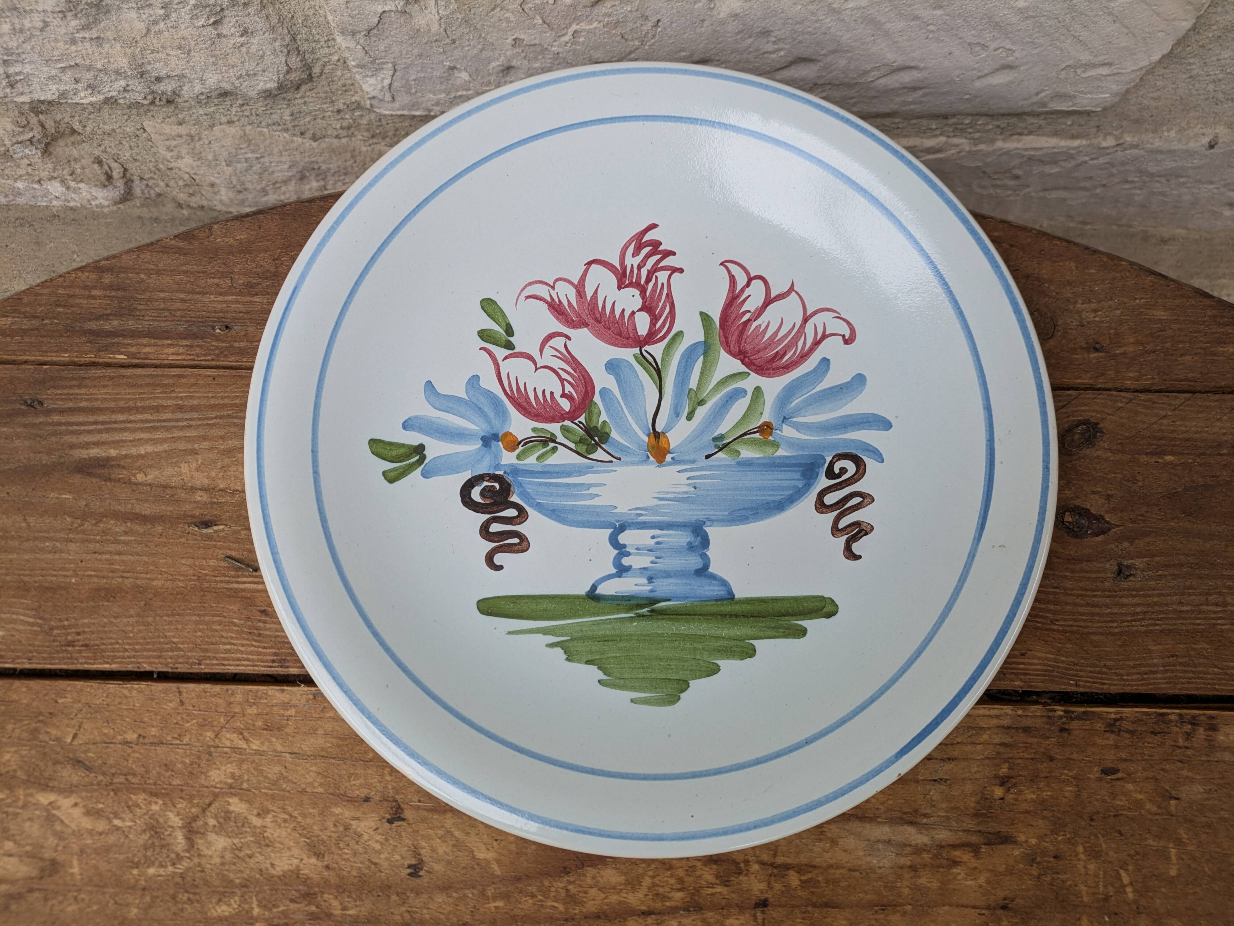 Plate with hand-painted flower bouquet on light blue background 25cm