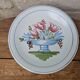 Plate with hand-painted flower bouquet on light blue background 25cm