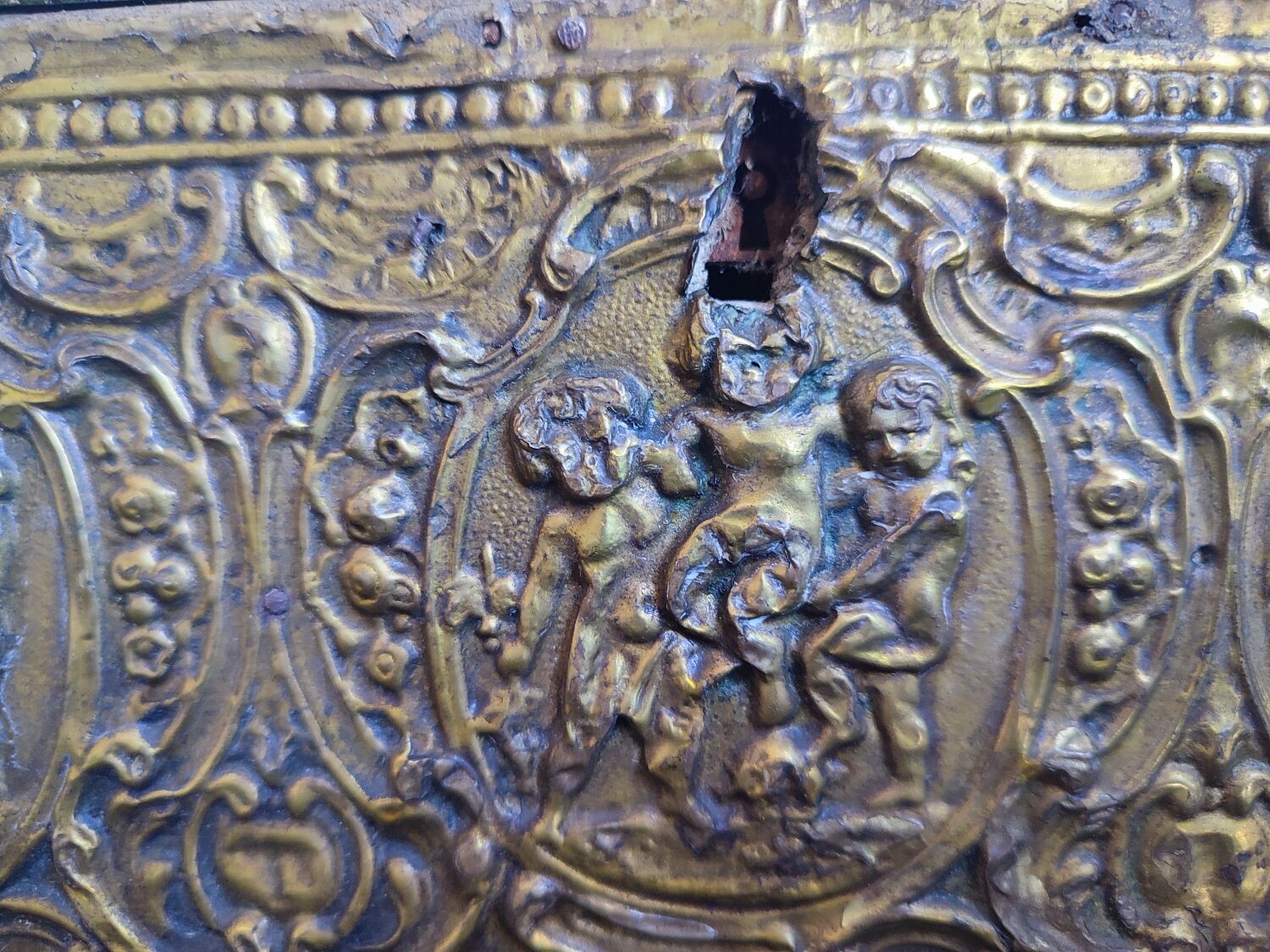 Old wooden box/casket covered with brass