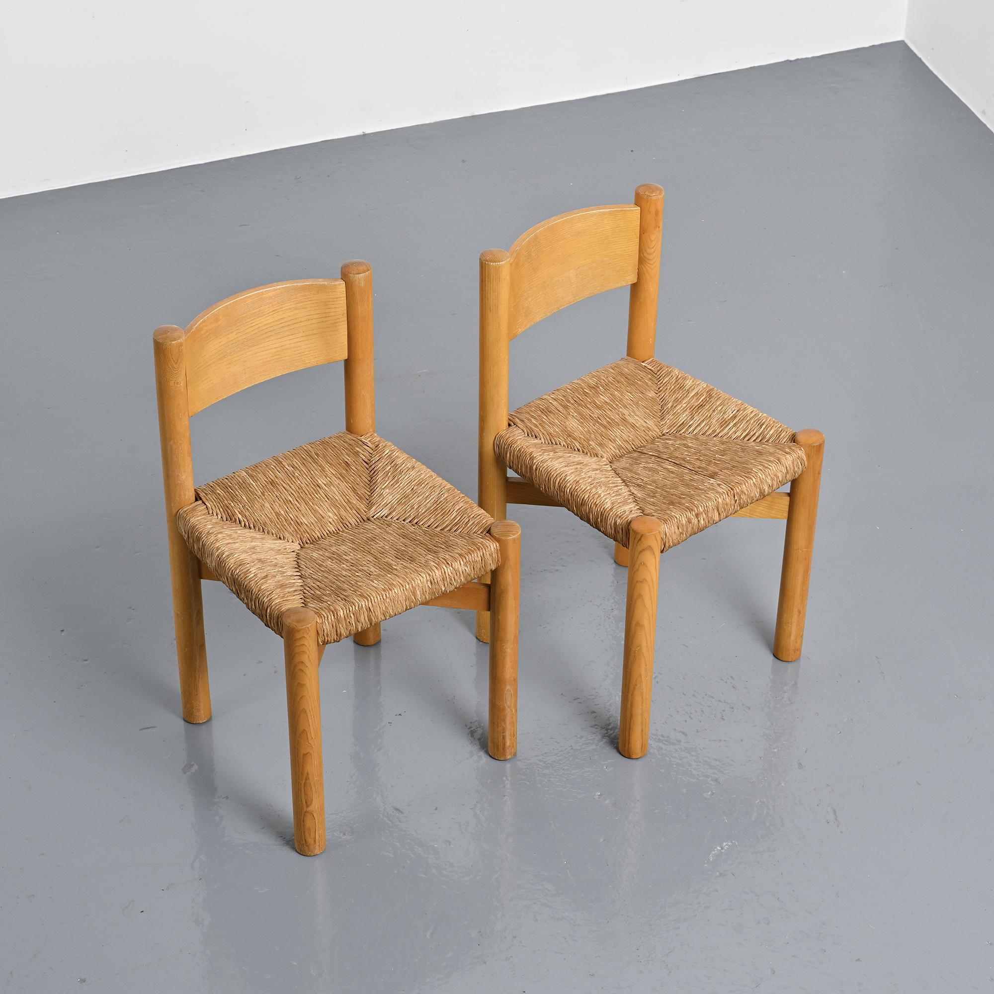 Pair of Méribel chairs by Charlotte Perriand, circa 1955.