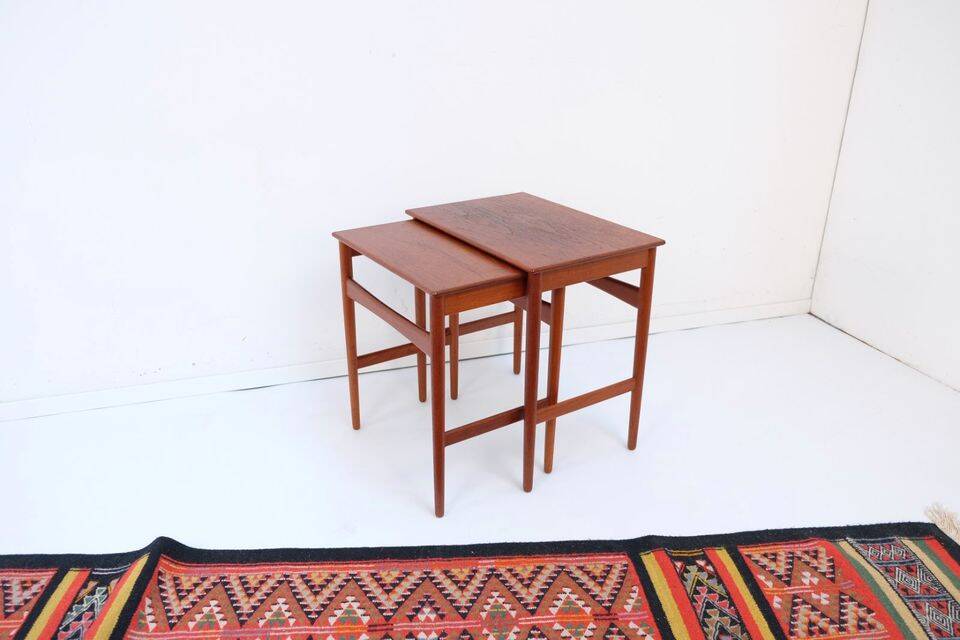 Mid-century side tables and nesting tables, in Wegner Tuck teak, Danish style.