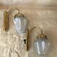 Pair of 1960 brass wall lamps and gilded frosted glass