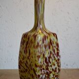 Yellow and white speckled decanter