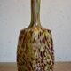 Yellow and white speckled decanter