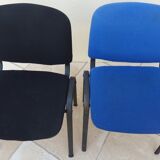 2 stackable chairs of black and blue fabrics