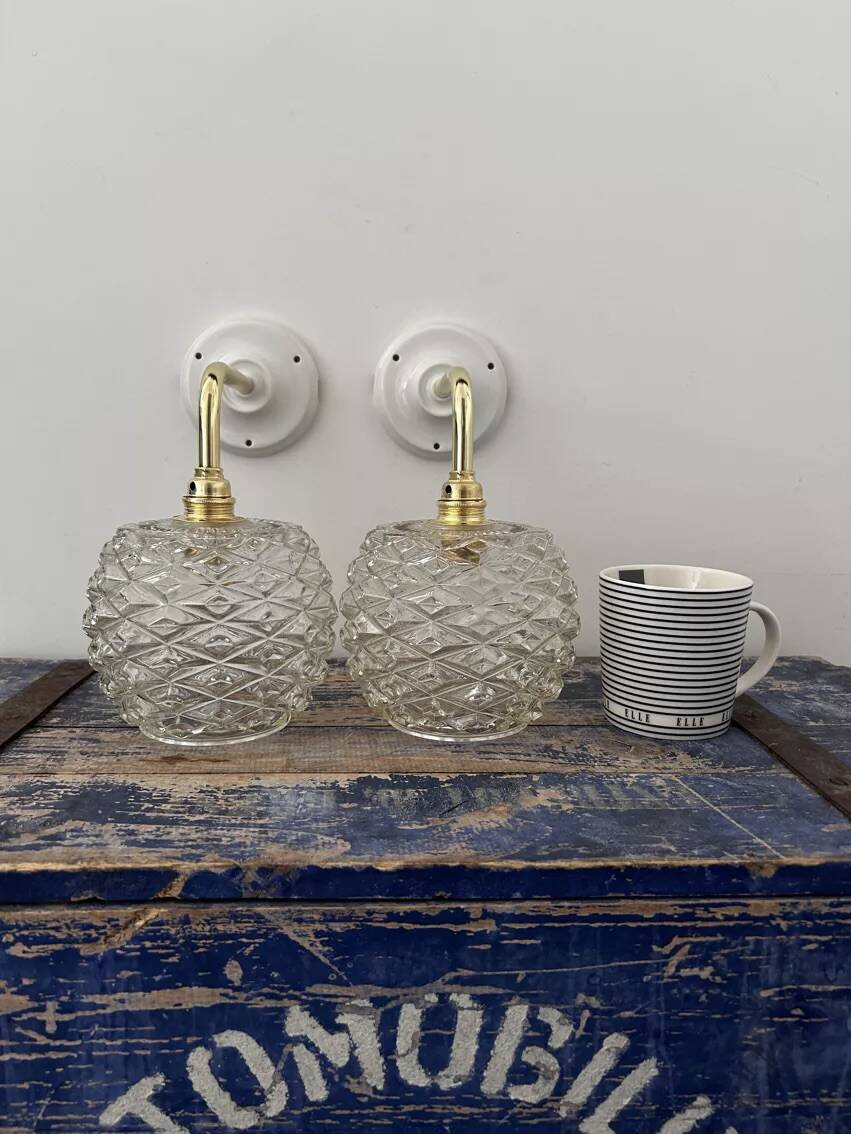 Pair of chiseled glass wall sconces
