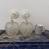 Pair of chiseled glass wall sconces