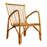 Children's rattan armchair & its old pink skin