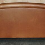 Two-seater leather armchair in Howard style by George Smith.