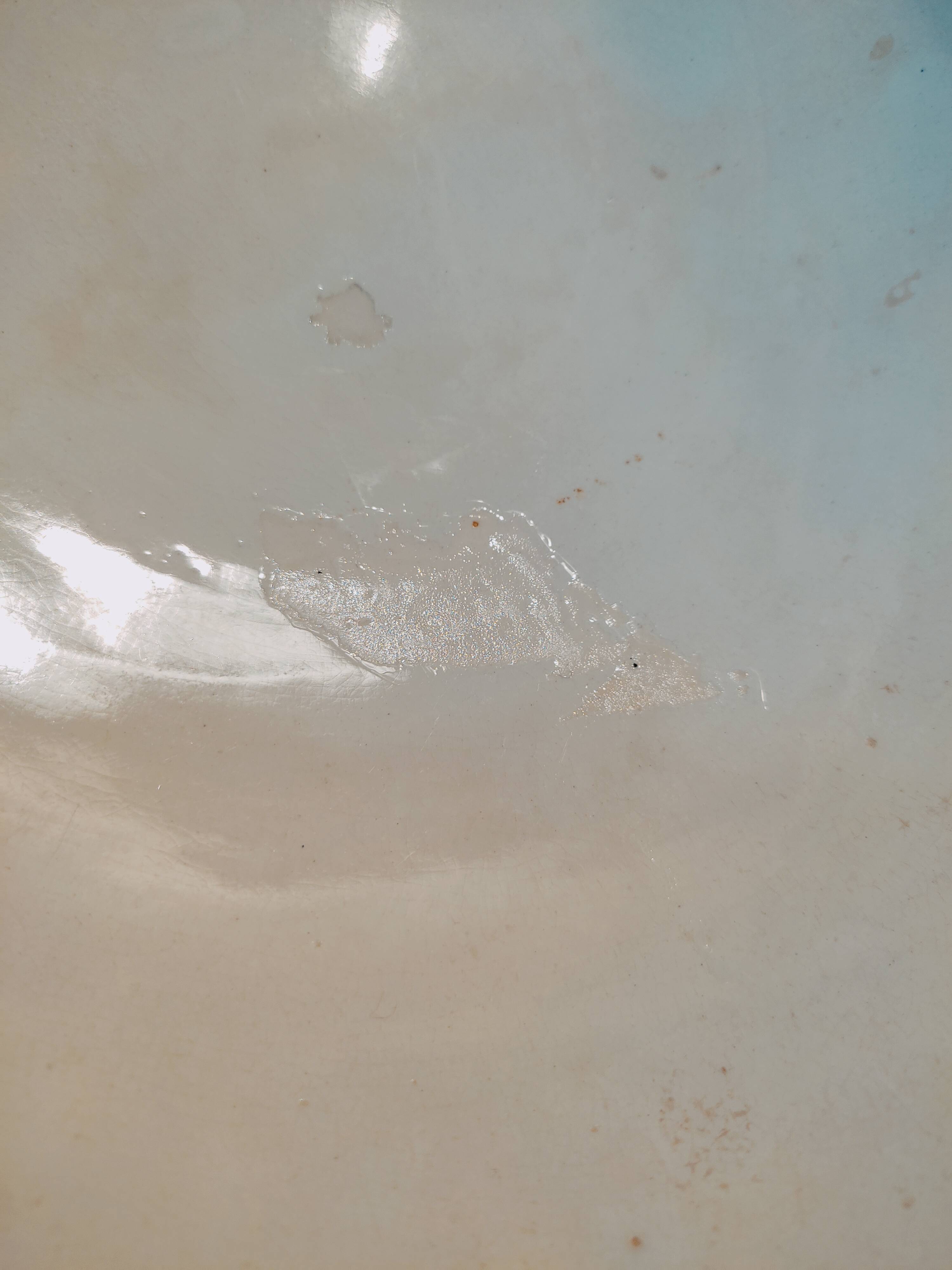 Old bowl in pedestic tiles