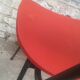 Lot of 6 red chairs in faux leather metal compass feet