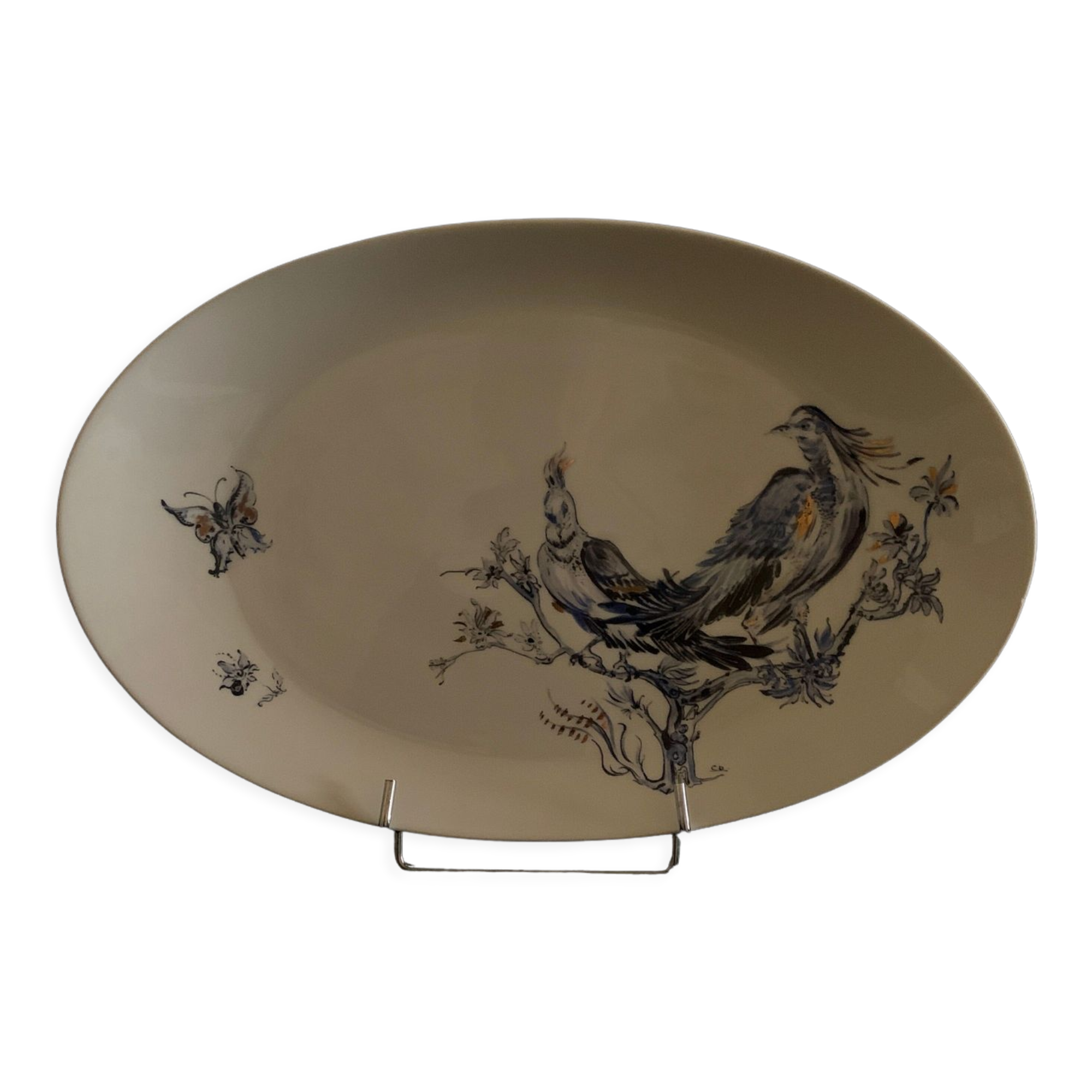 Plate signed Arsberg, "The Buffoon" after a model from the Royal Manufacture of Sèvres.