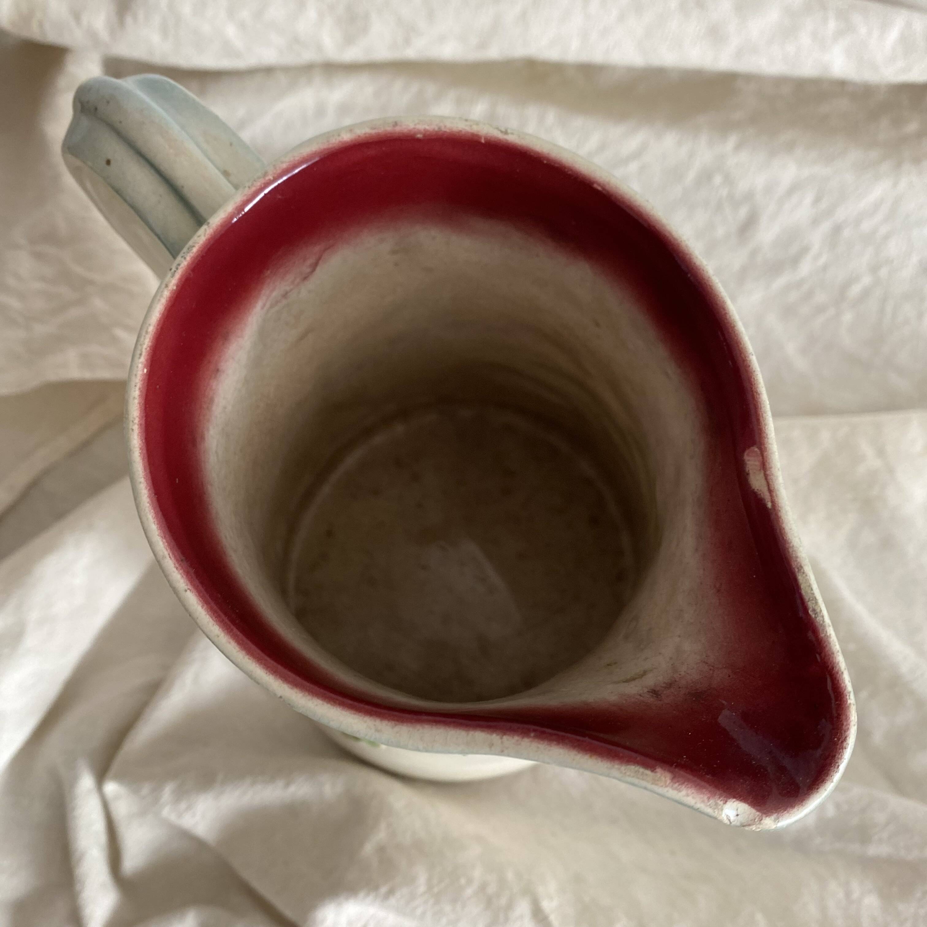 Antique pitcher in St Clément art nouveau slip