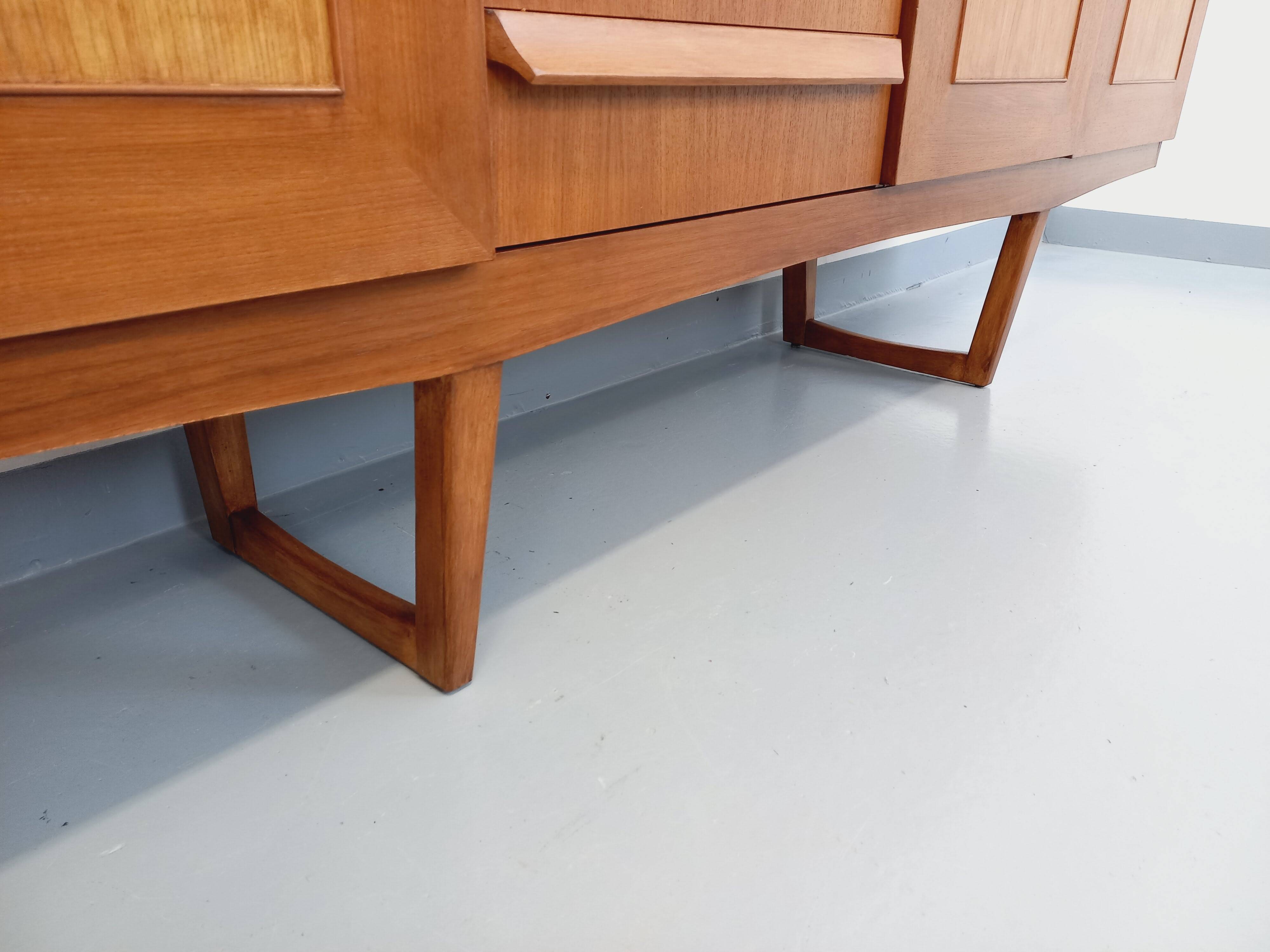 Vintage Scandinavian style sled foot sideboard in teak from the 60s