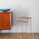 Small brass side table with a teak top, 1960.