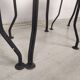 4 black garden chairs