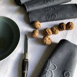 Suite of four napkins tinted in smoke grey