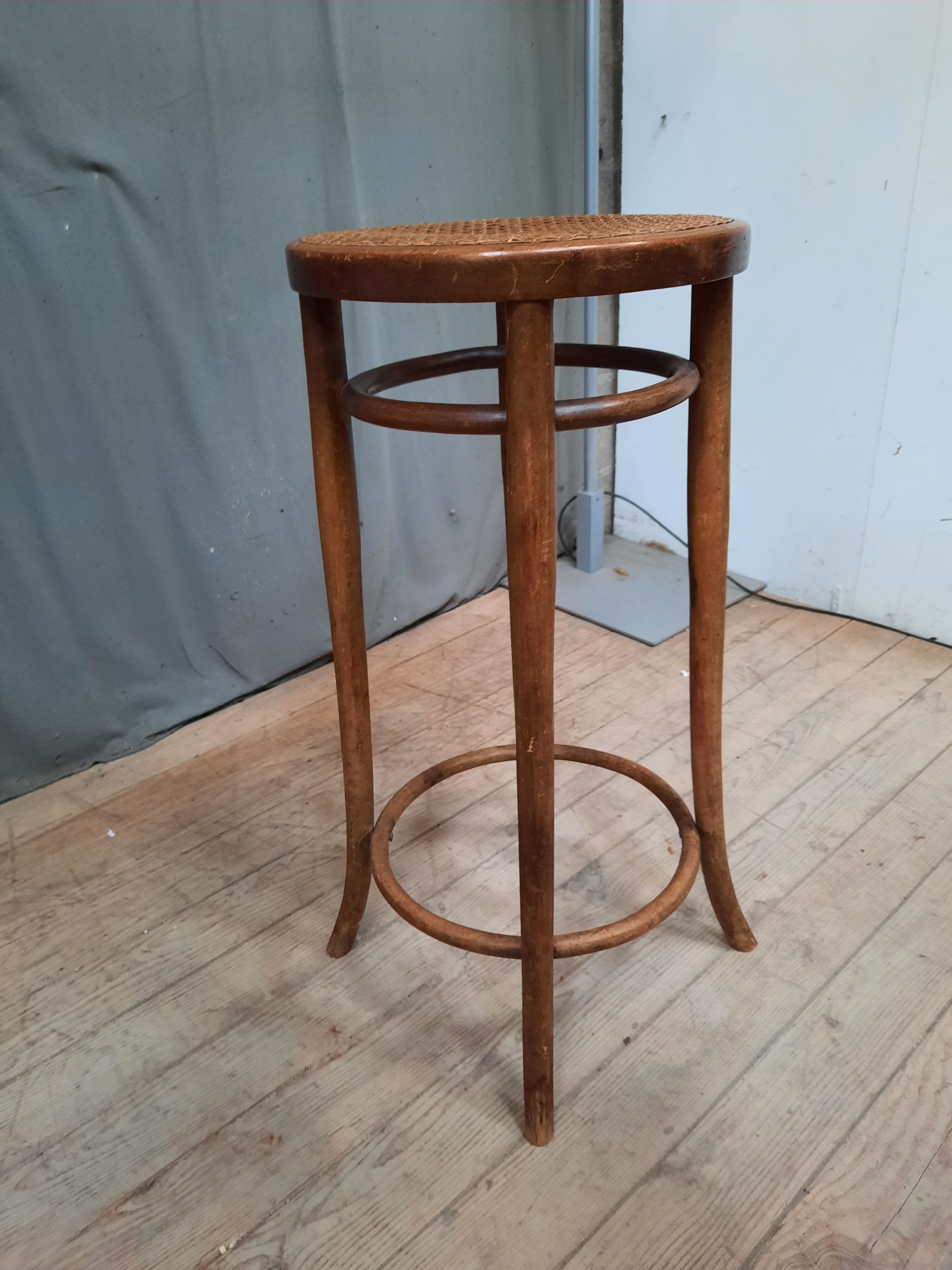 High bent wooden stool
