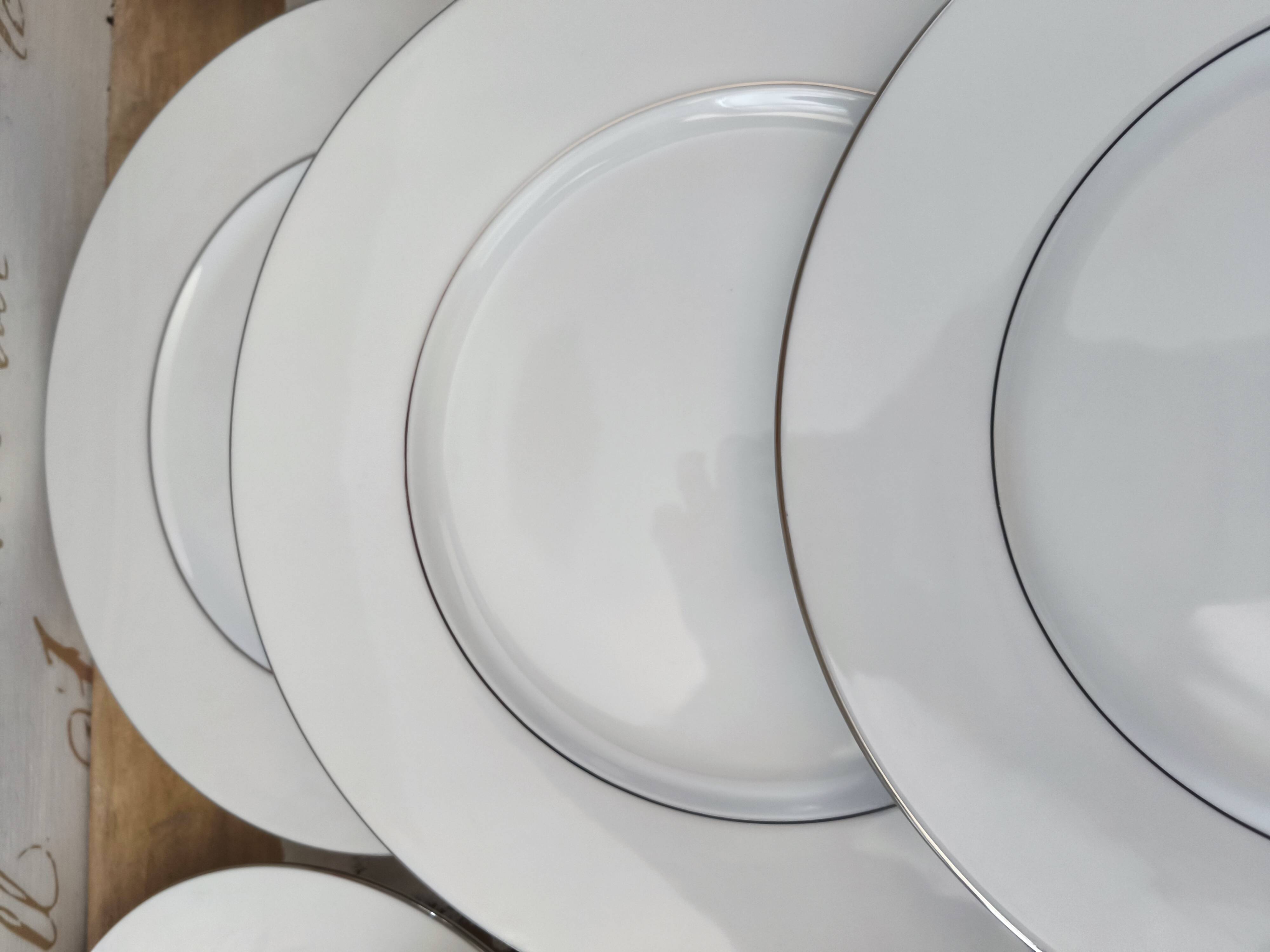 Set of 12 white porcelain dinner plates with double silver rim