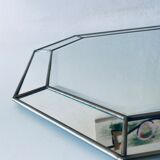 Old octagonal beveled mirror with parcloses