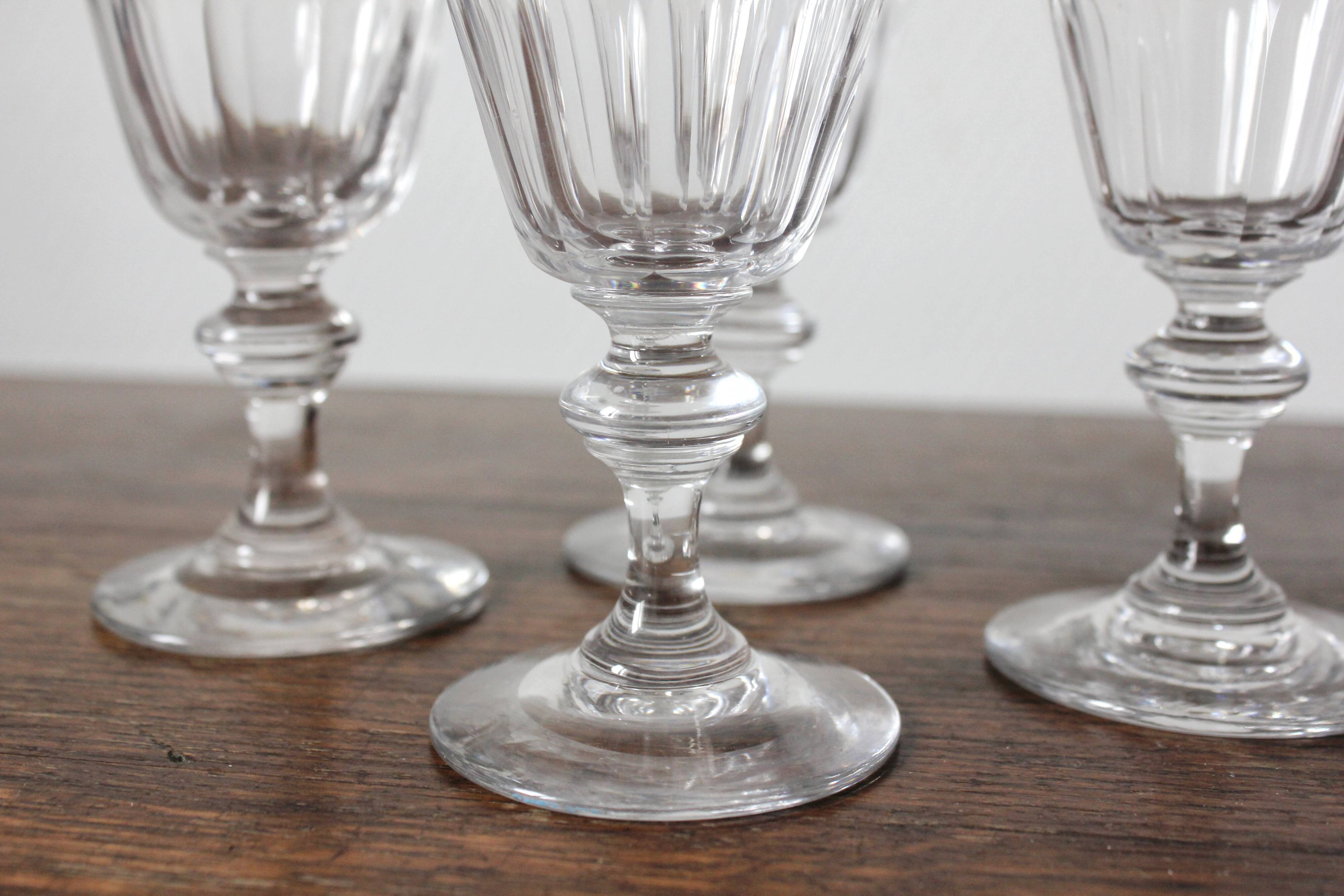 4 glasses with white wine in crystal ringing the nineteenth