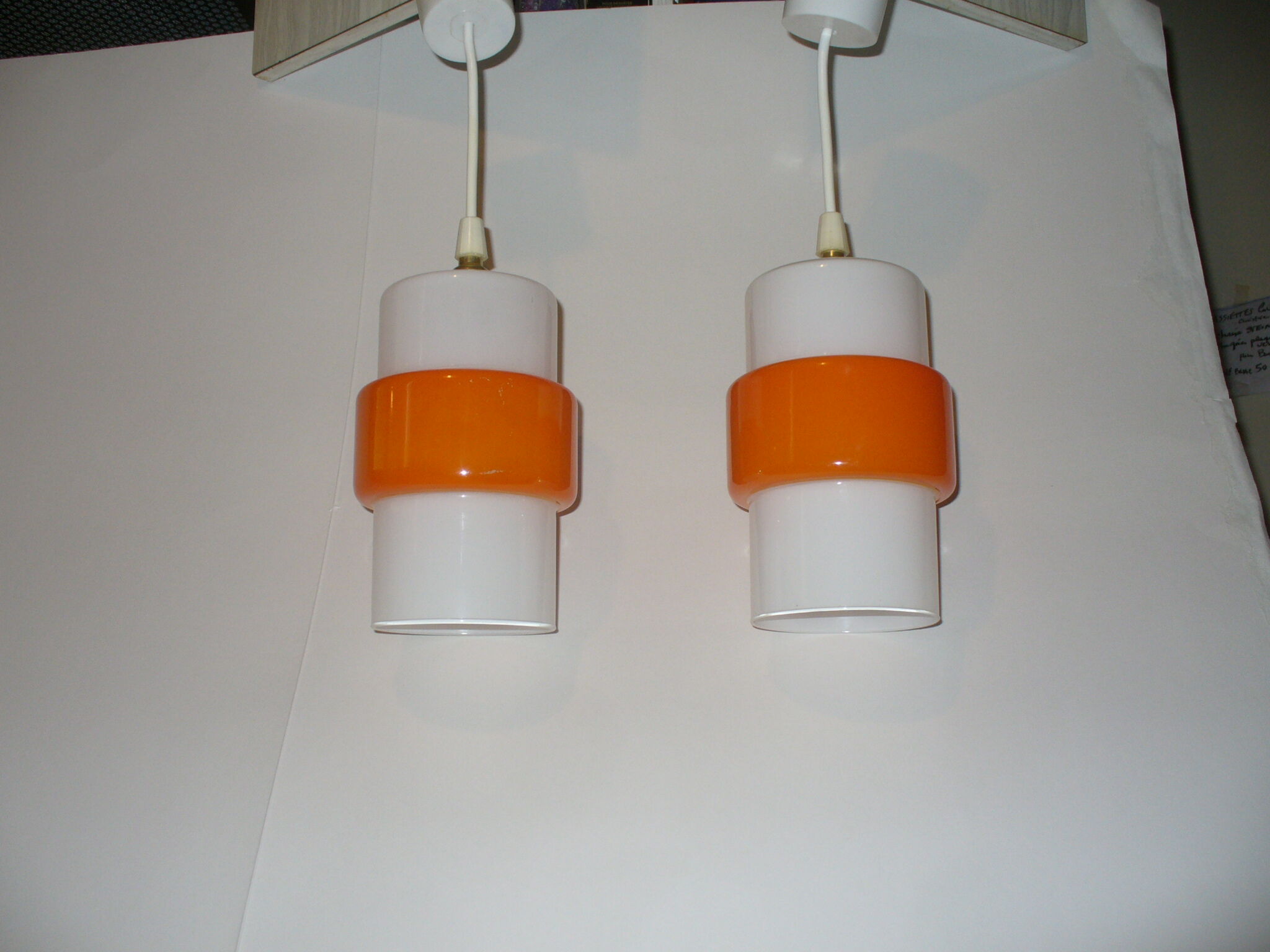 Pair of orange suspensions from the 70s