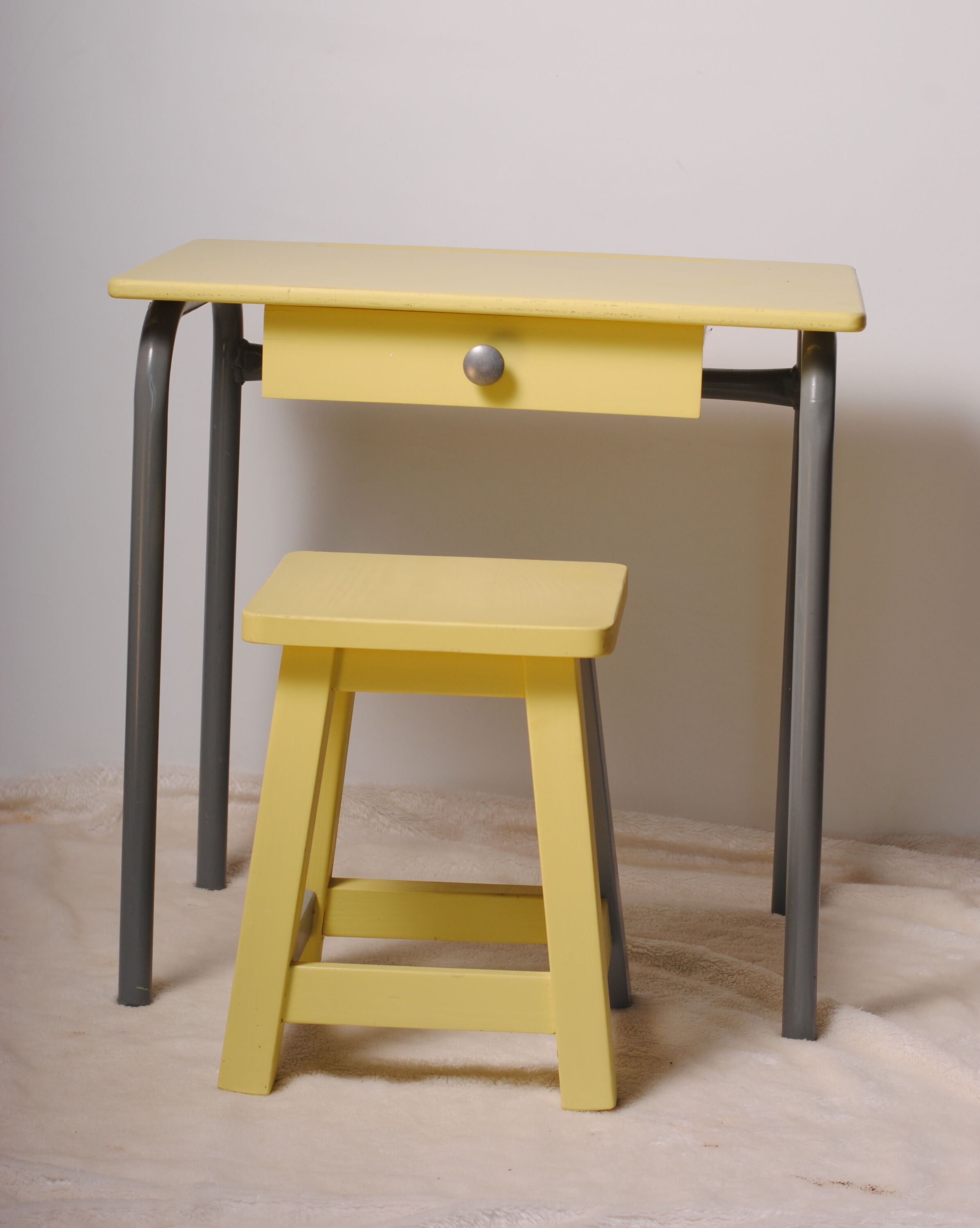 Yellow child office with his stool