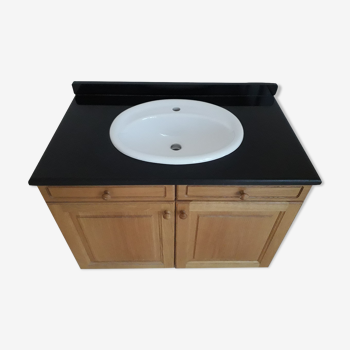 Vintage sink, black granite, oak furniture.