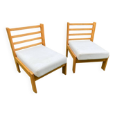 Pair of chalet-style lounge chairs in ecru cotton, circa 1960