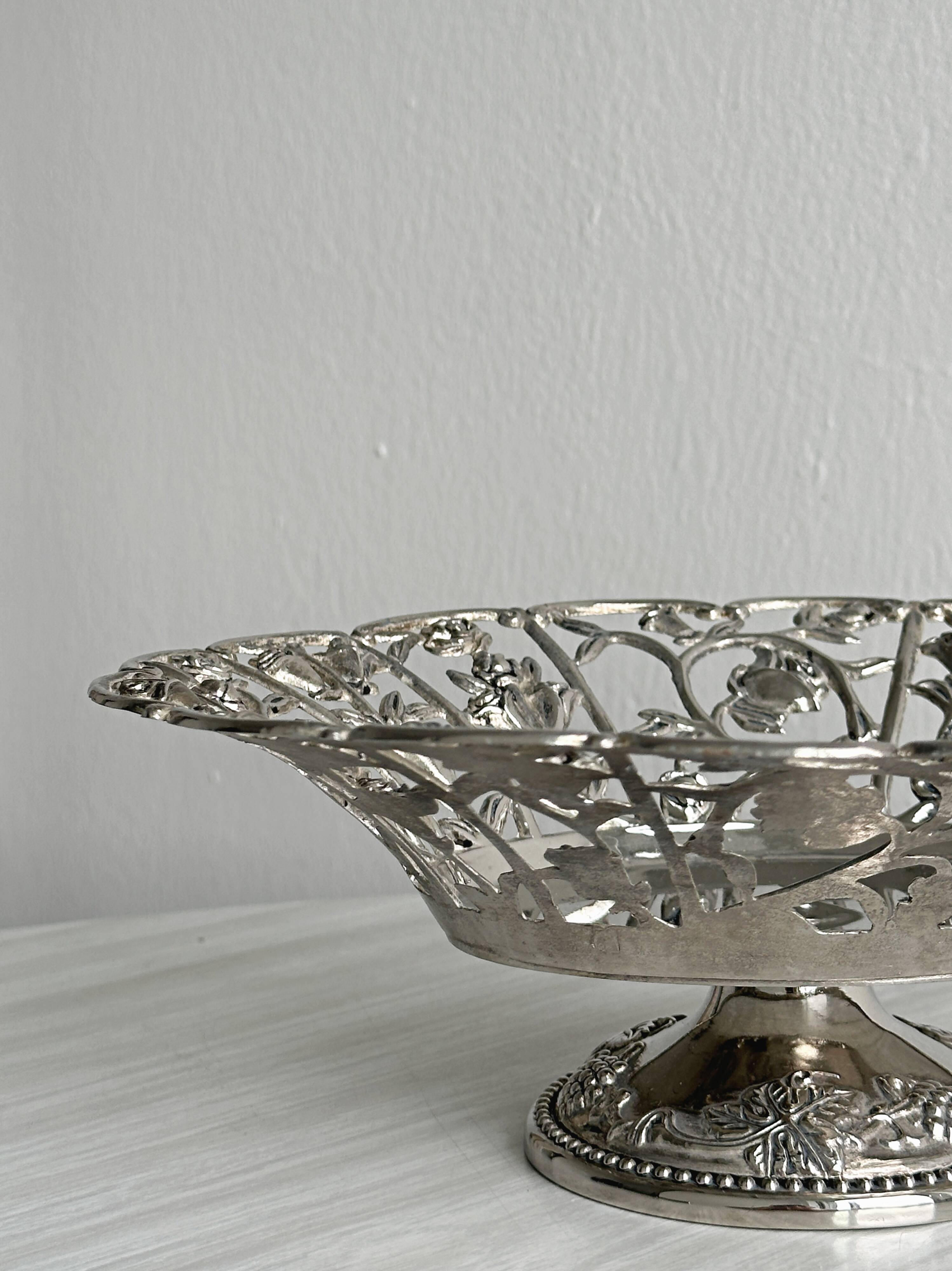 Silver-plated openwork metal stand