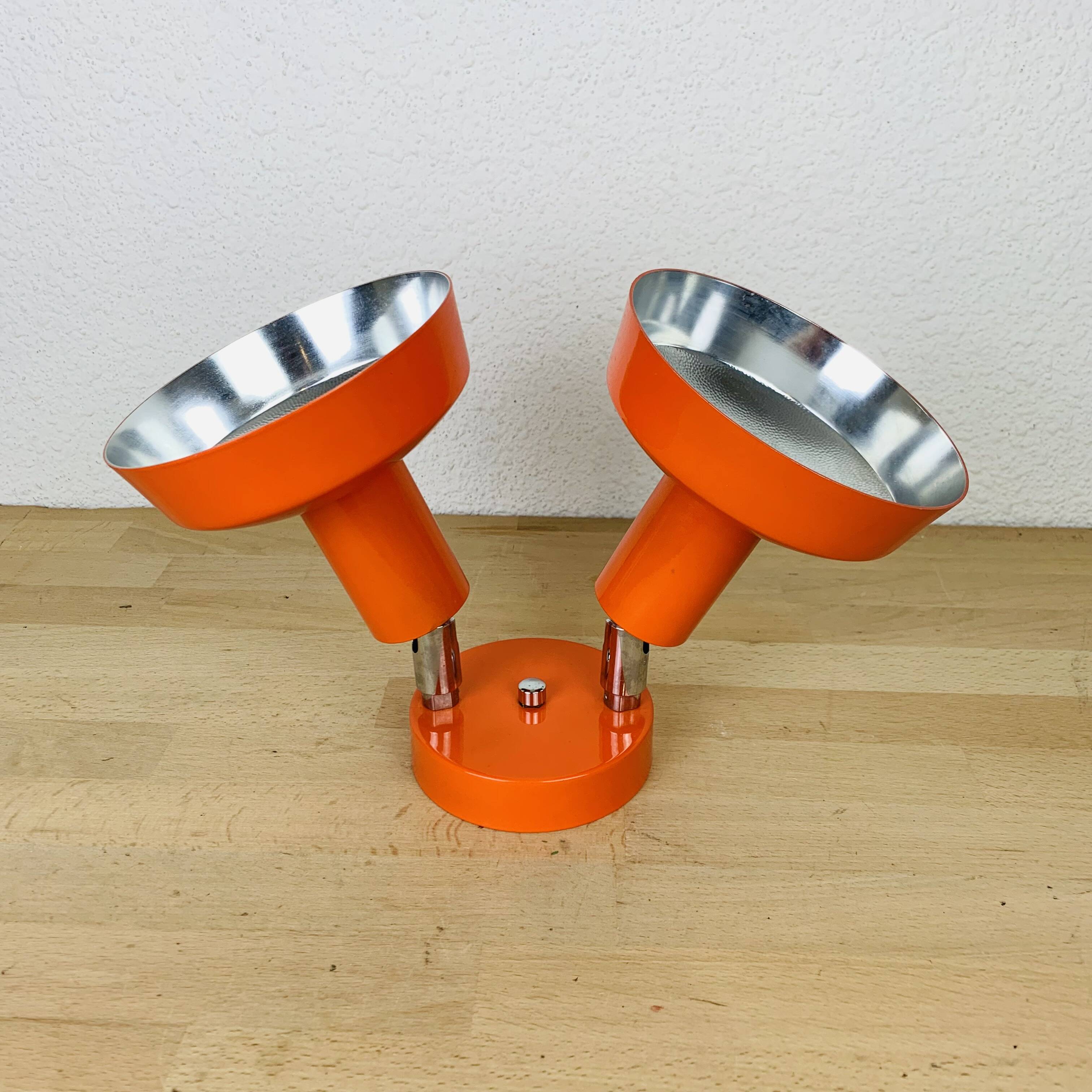 Double adjustable orange spotlight wall lamp from the 70s