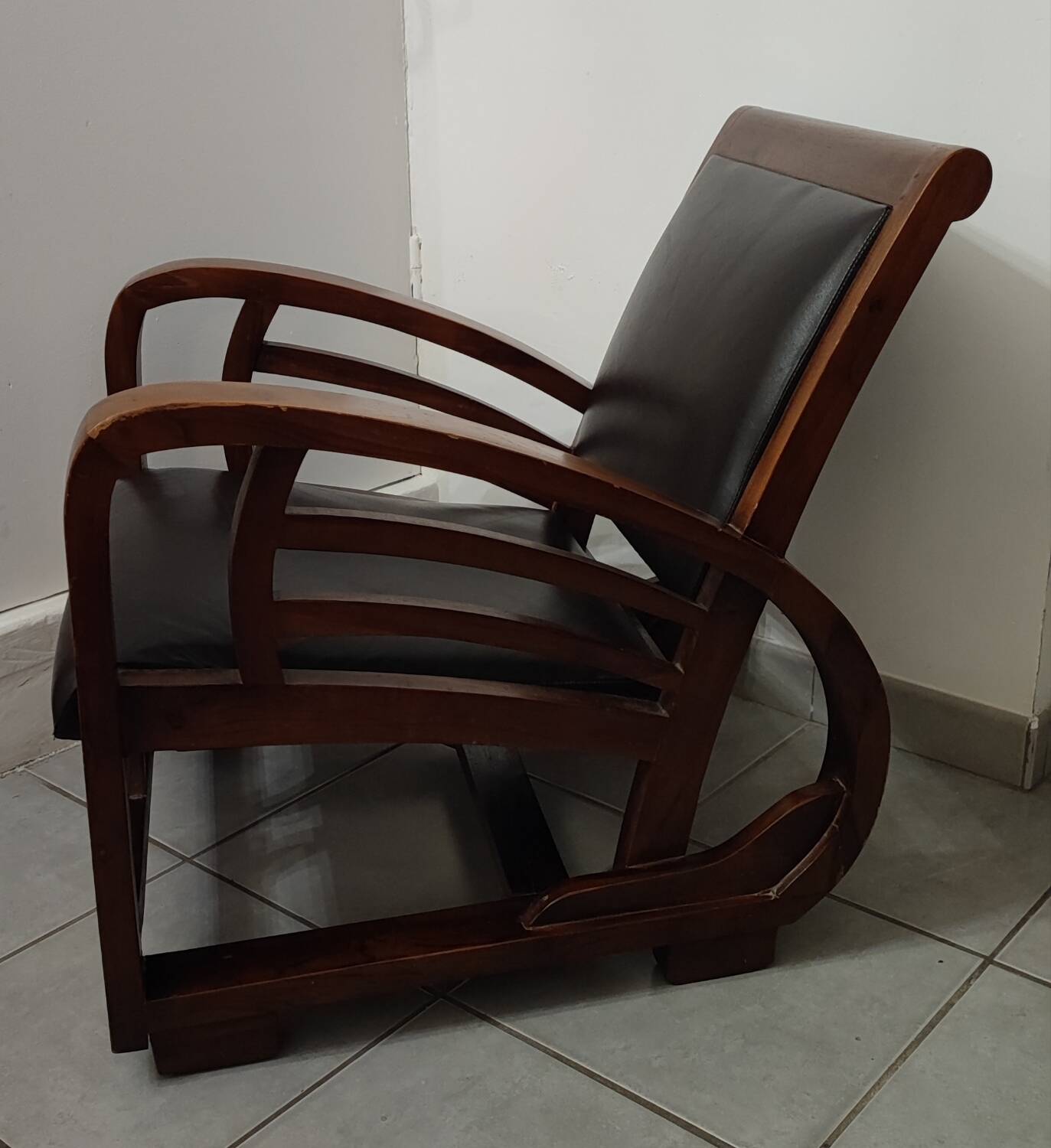 Leather and teak armchair