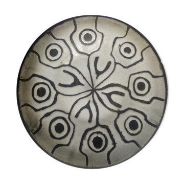 Large black and white brutalist dish