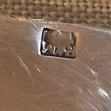 Round serving platter in silver-plated metal