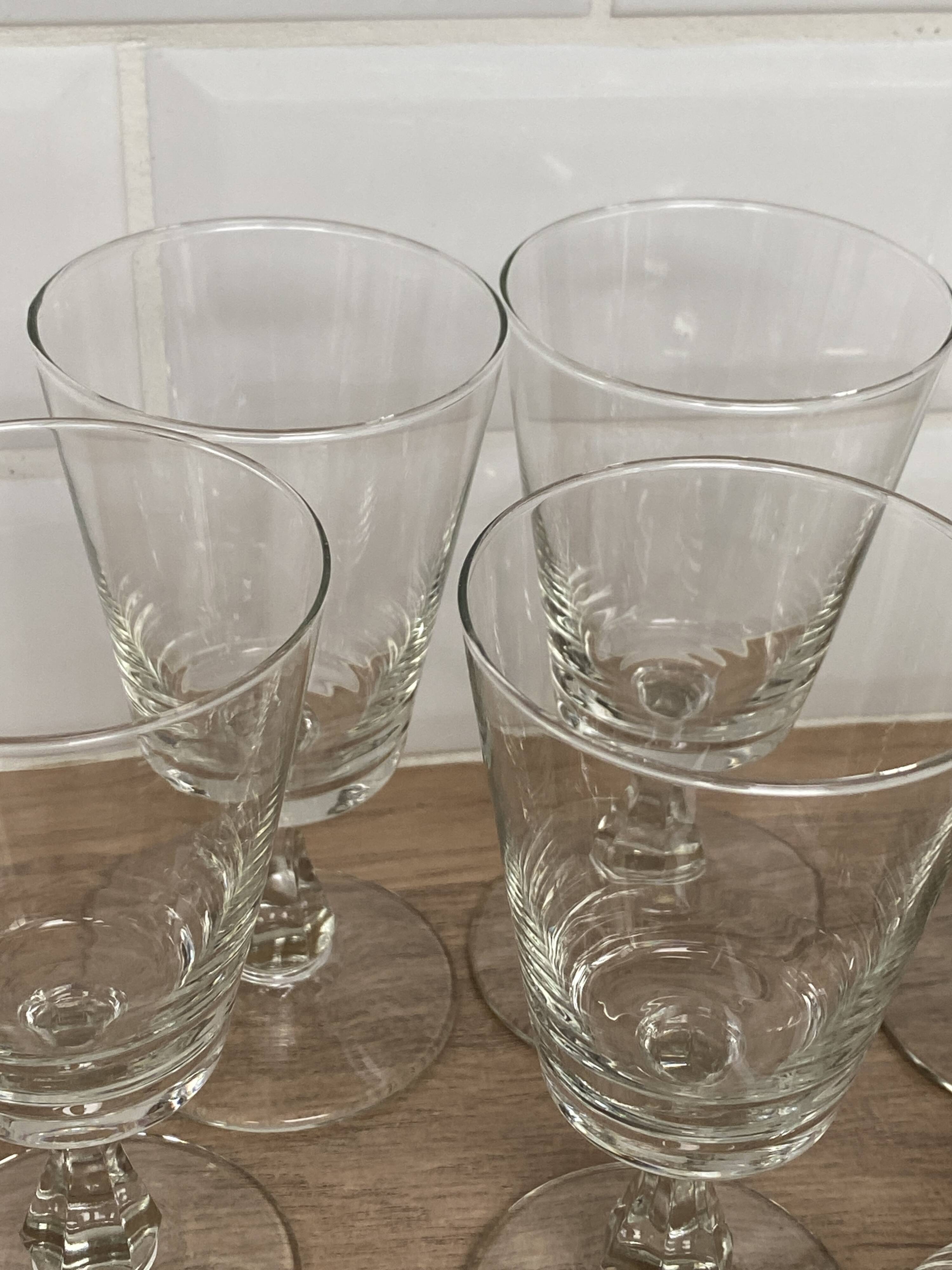 Set of 9 white wine glasses