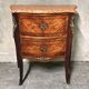 Louis XV style commode in rosewood marquetry, 20th century.