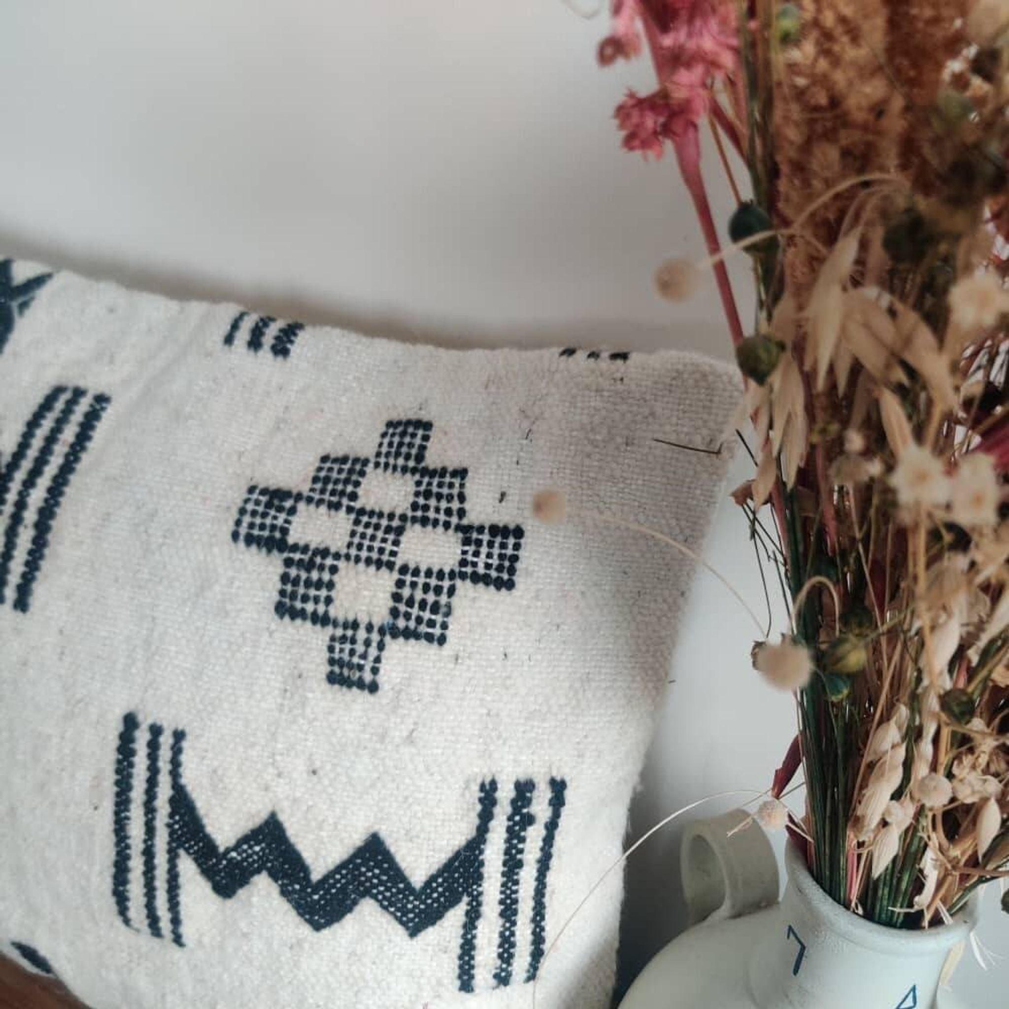 Moroccan kilim cushion in black and white.