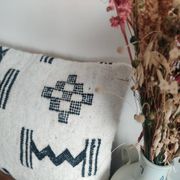 Moroccan kilim cushion in black and white.