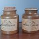 Duo of glazed stoneware mustard pots with label and corks, armand bizouard, amora, 1950