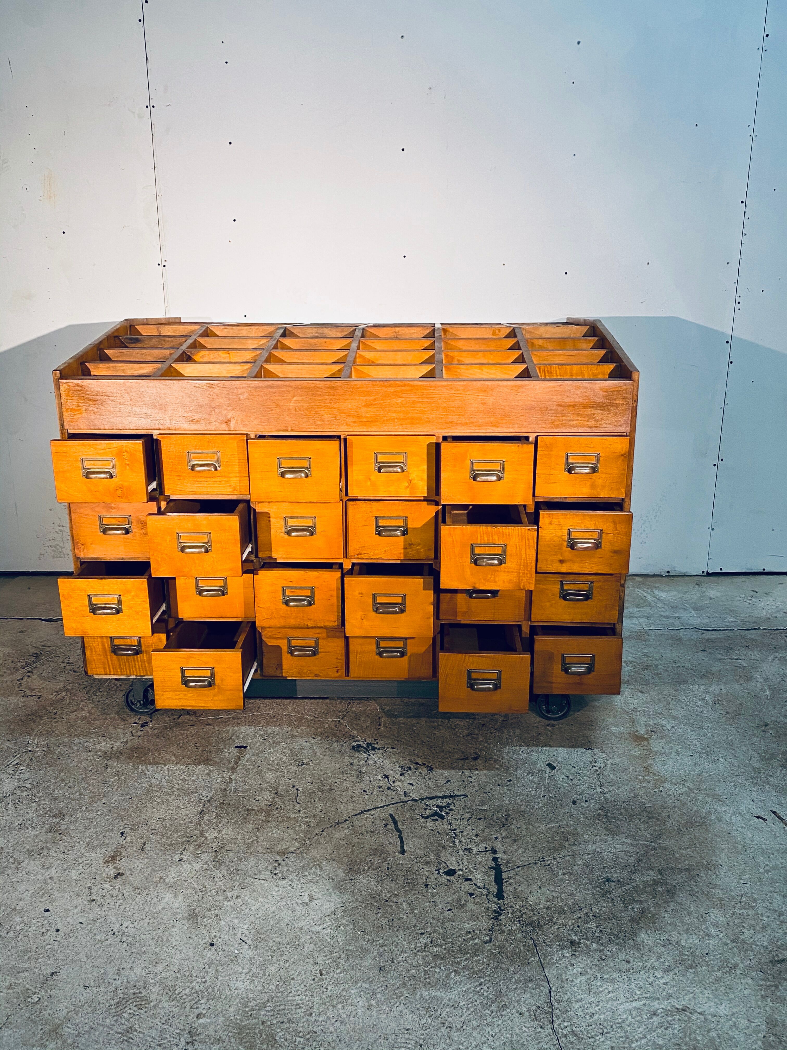 Double-sided wooden industrial filing cabinet with 48 vintage drawers